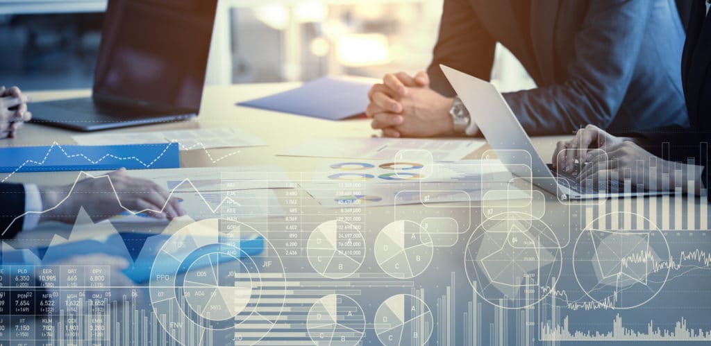 Business and statistics concept. Business meeting for a medical billing company.