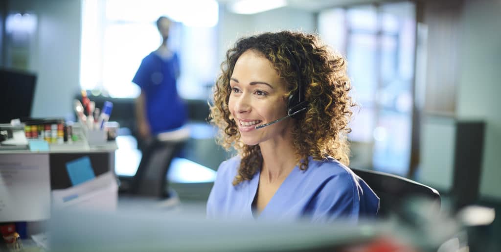 A healthcare provider conducting a remote consultation with a patient