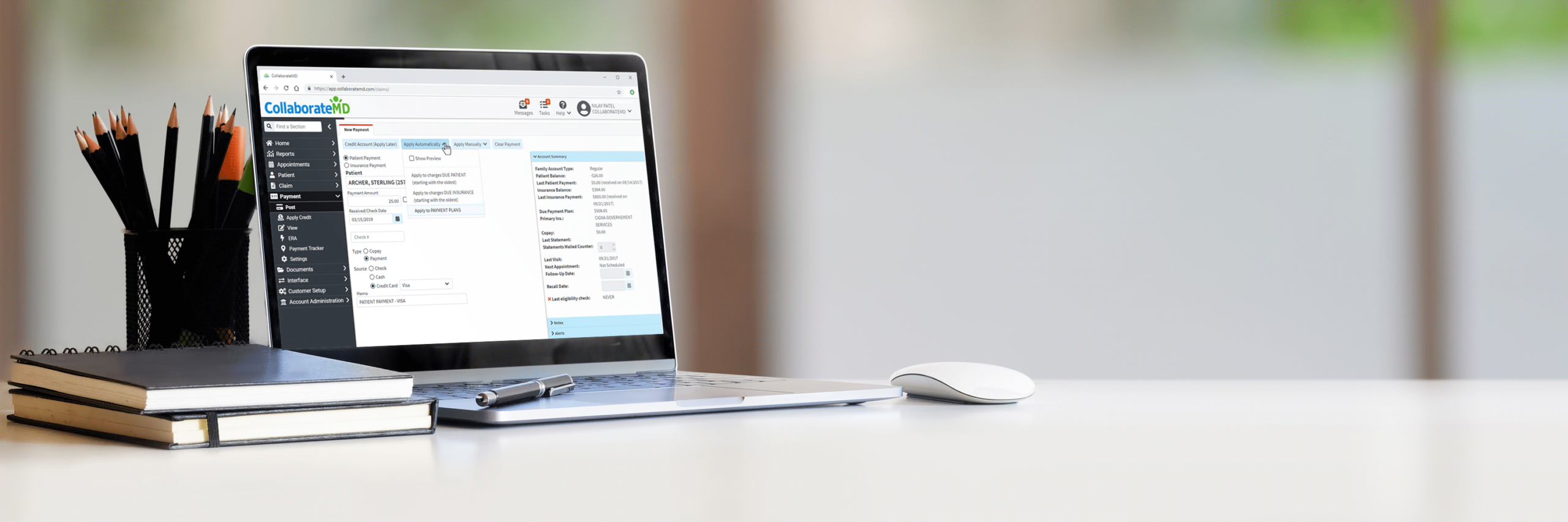 Laptop opened to Payment screen of CollaborateMD