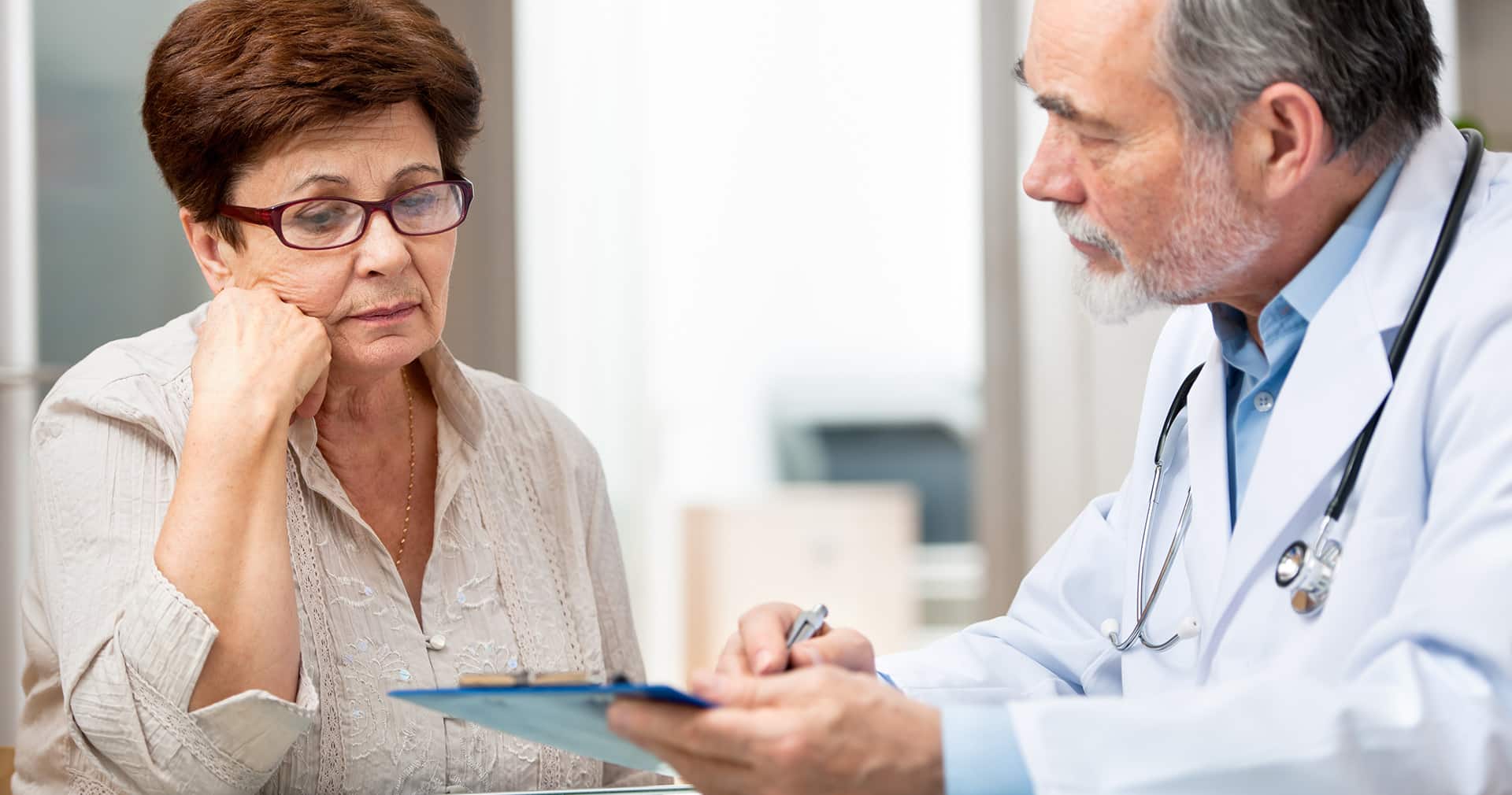 Doctor addressing patient concerns in a clinic