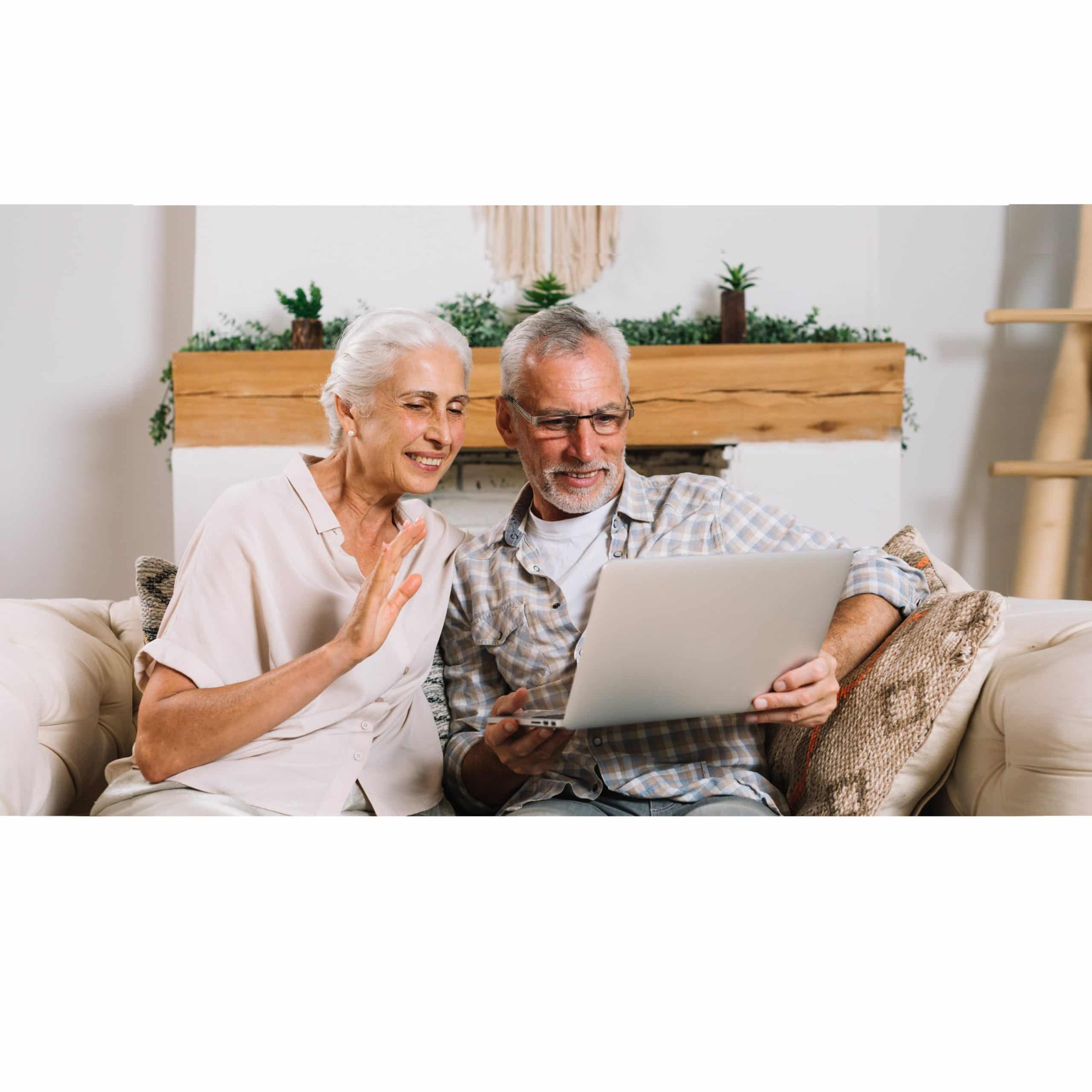 Elderly couple using telemedicine on their laptop
