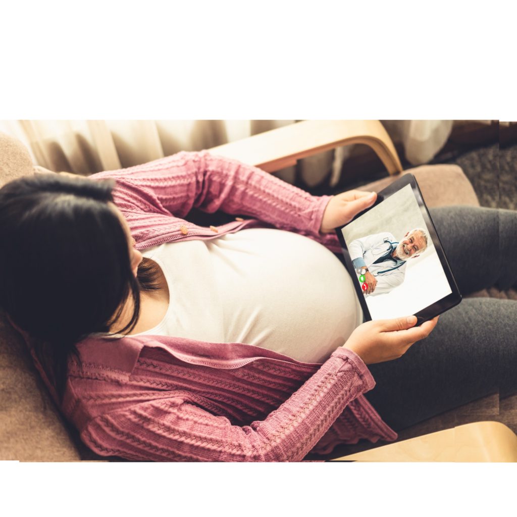 Pregnant women speaking to physician via telemedicine software feature.