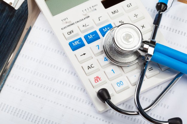 health care stethoscope and calculator